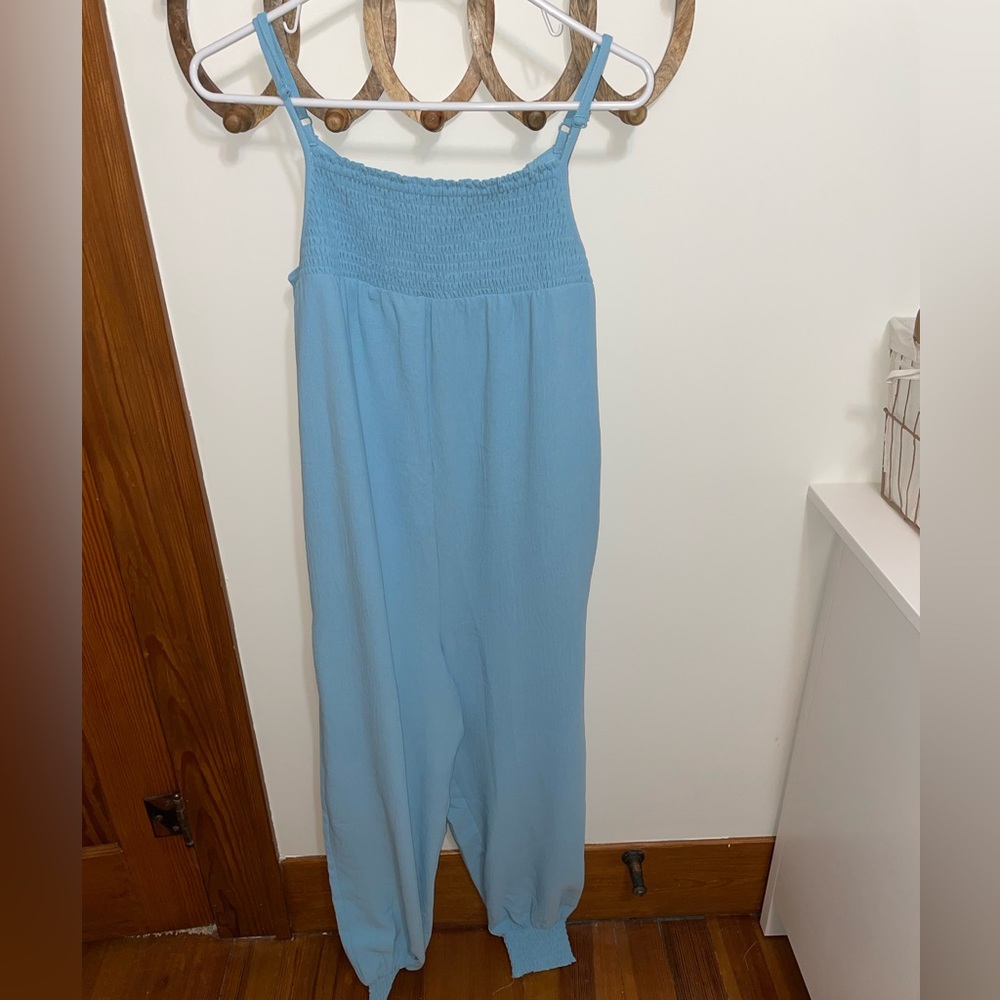 Boutique jumpsuit. Beautiful blue color.